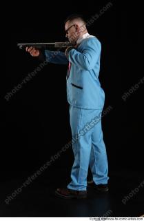 Mikael AGENT STANDING POSE WITH SHOTGUN